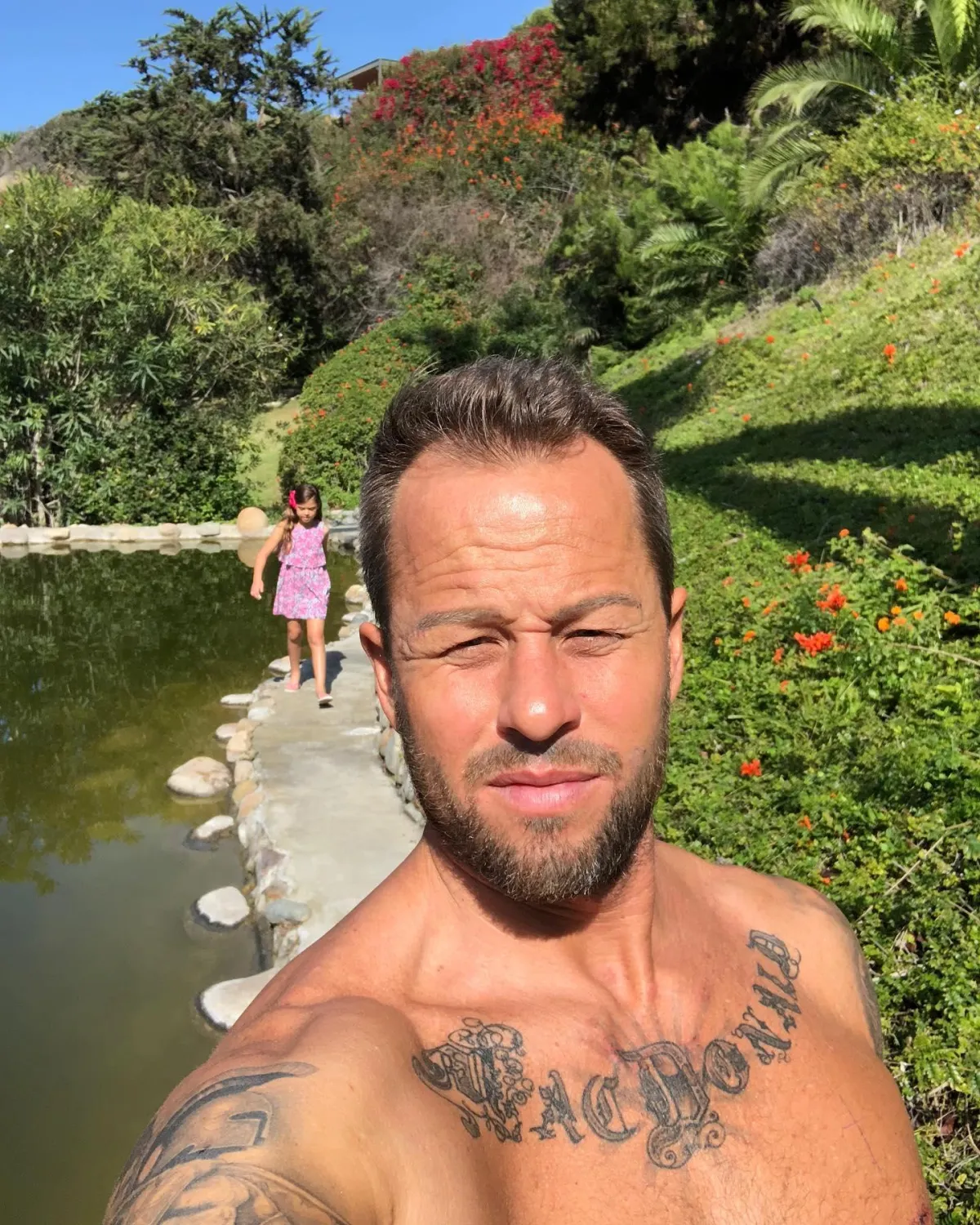 Brian MacDonald with his daughter outdoors near Dana Point, Orange County